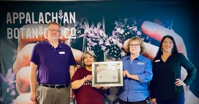 From left: Mike Lamb, DRS Employment Specialist; Marina Sawyer, Chief Technical Officer; Jocelyn Sheppard, President and Founder; Alyce Almond, DRS Employment Services Manager