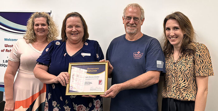 DRS presents framed certificate to Keyser Auto Service Center representative